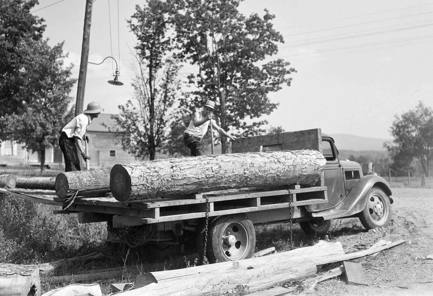 1937 Loading Lumber On A Truck Lamoille County Vt Old Keychain Reprint