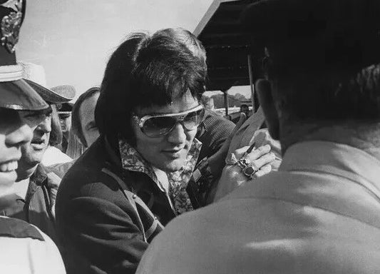 Elvis Presley Signing Autographs Wearing Sunglasses Picture Magnet
