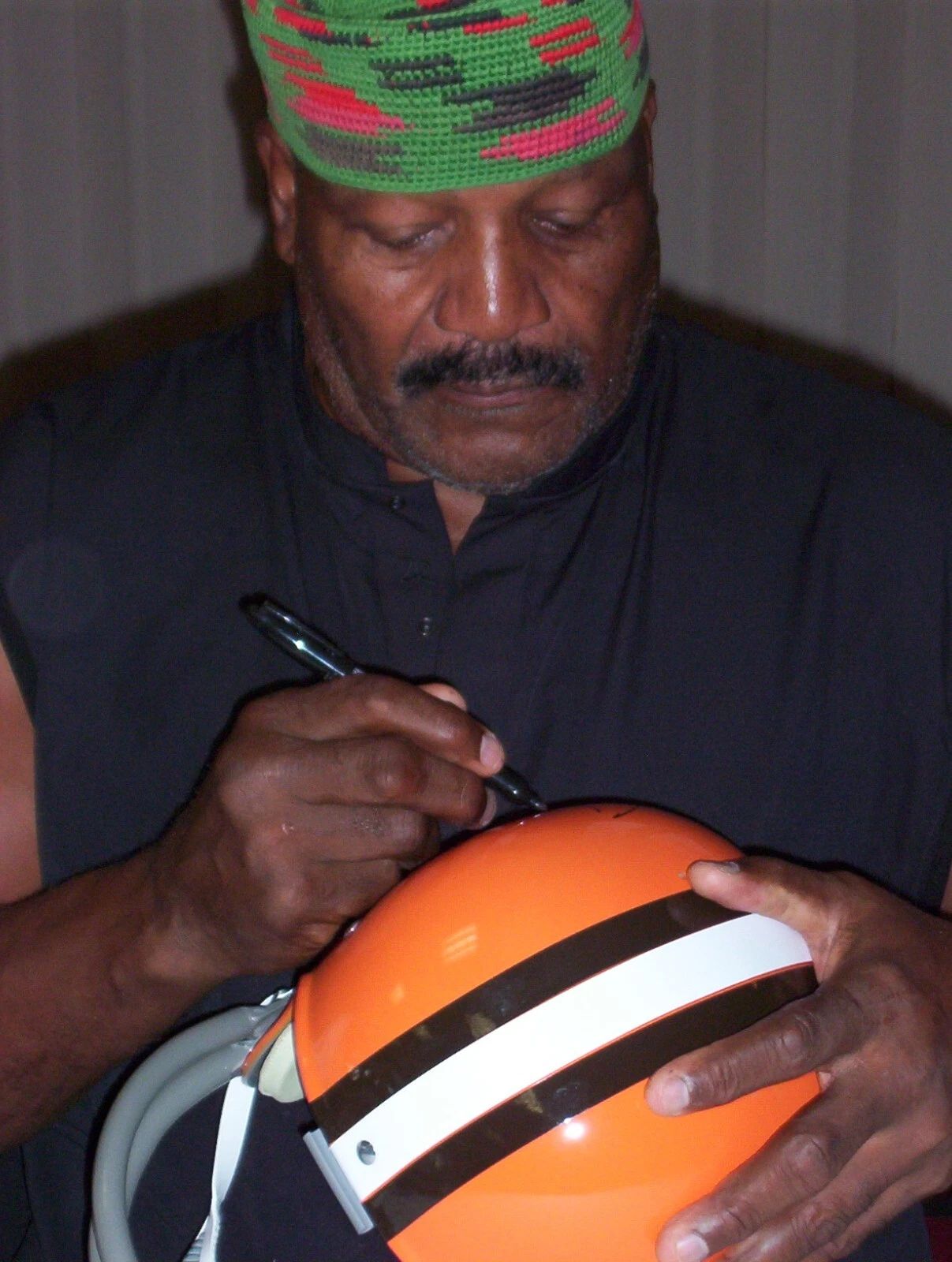 Football Player & Actor Jim Brown Signing A Helmet Picture Photo Print
