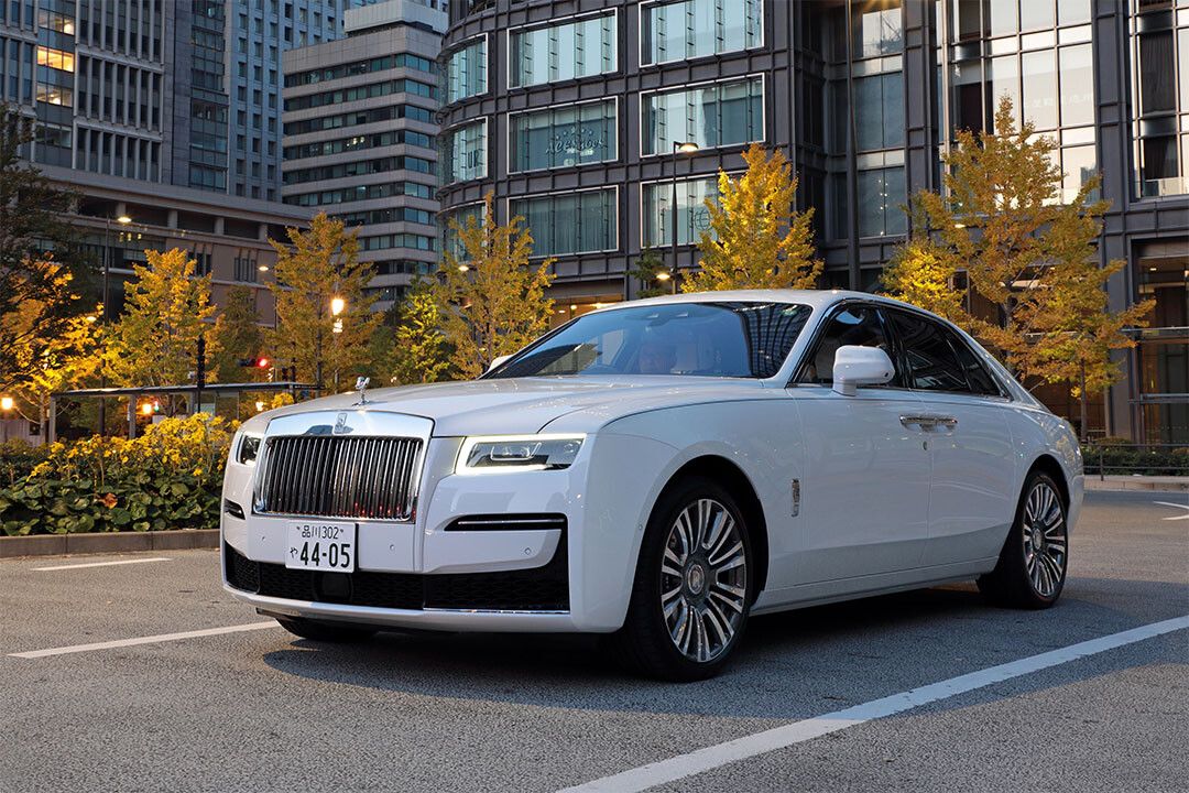 Rollsroyce Ghostin Front Of Buildings Wall Indoor Jigsaw Puzzle