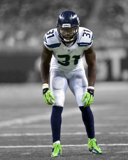 Seattle Seahawks Kam Chancellor Glossy Photo Spotlight Football Poster