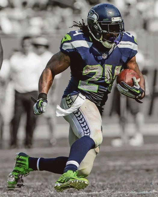 Seattle Seahawks Marshawn Lynch Glossy Magnet 'Spotlight' Football Print