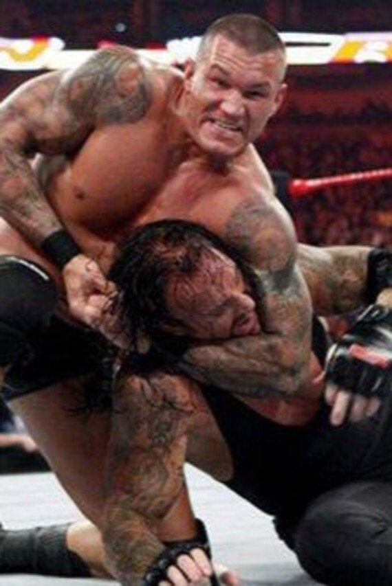 WWE Rivals The Undertaker Vs. Randy Orton Keychain