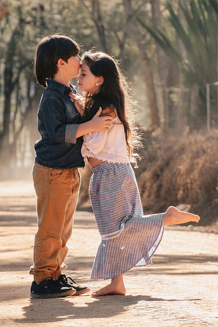 Young Love Small Boy And Girl Kissing Picture Magnet